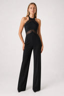 https://cdn.shopify.com/s/files/1/0682/7661/7389/files/ElieSiyahJumpsuit01-Front.jpg?v=1777823991