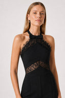 https://cdn.shopify.com/s/files/1/0682/7661/7389/files/ElieSiyahJumpsuit06-FrontDetailCloseUp.jpg?v=1777823991